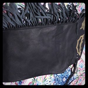 Black chaps with gold stars